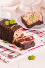 Sponge cake with chocolate frosting.