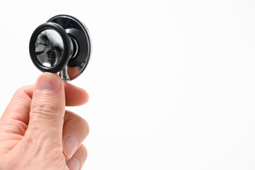 手に持った聴診器　白バック　顔無し