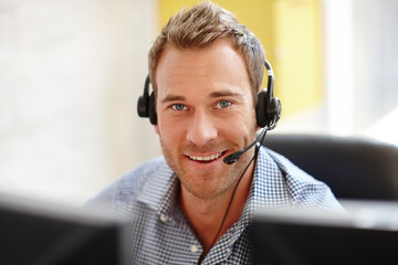 He knows how to sell your product. Portrait of a male customer service representative at his...