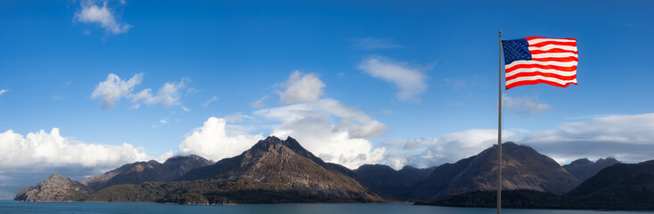 American National Flag Composite with Pacific Ocean West Coast in background. Cloudy Blue Sky Art Render. Landscape from Alaska, USA.