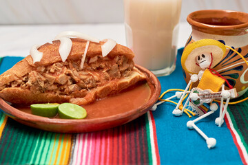 Authentic Torta Ahogada, traditional food from Guadalajara, Jalisco in Mexico.