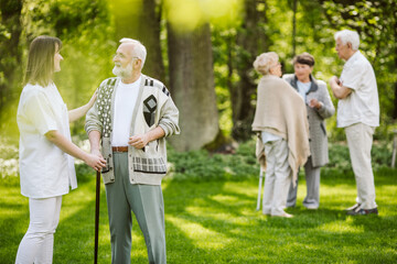 Fototapeta premium Sunny afternoon in the garden of nursing home for elderly