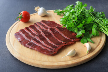 Turkish pastrami. sliced bacon. Pastrami is made from the ribeye and beef tenderloin parts of the cow. local name kayseri pastrami