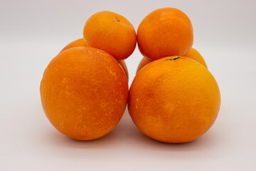 Few oranges on white background