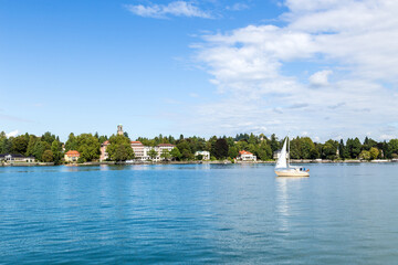 Bad Schachen, Germany. Yacht on the background of the picturesque coast