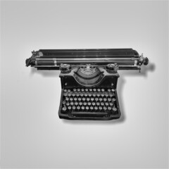 Old typewriter on white background.