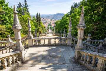 monumental stairway to Nossa Senhora dos Remédios - Our Lady of Remedies Sanctuary with a view to Lamego city, district of Viseu, Portugal - obrazy, fototapety, plakaty