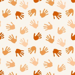 Seamless coloured handprint pattern for fabrics and packaging and gifts and cards and linens and kids and wrapping paper