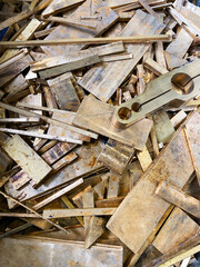 Brass scrap plate offcuts rejects from a manufacturing process.