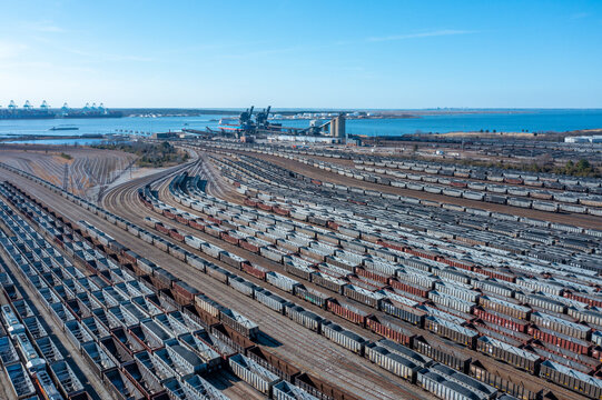 Aerial View Top Down Of Rail Cars In A Busy Train Yard