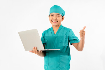 Portrait of Young Asian Boy Dressing to be Doctor, Holding Laptop Isolate on White Background, Education Concept