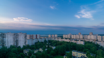 Cloudy summer morning in a city