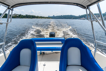 Obraz premium Blue seats in motor yacht. 