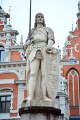 Fototapeta na wymiar Riga, Latvia - Statue of Roland, Monument of Riga's protector in front of The House of the Blackheads on Riga's Town Hall Square,