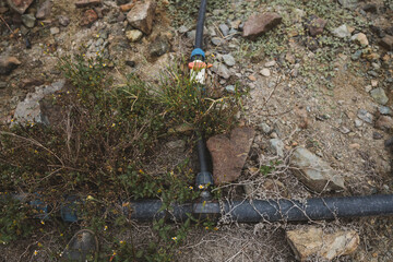 Naklejka premium water pipe in the mountain of peru