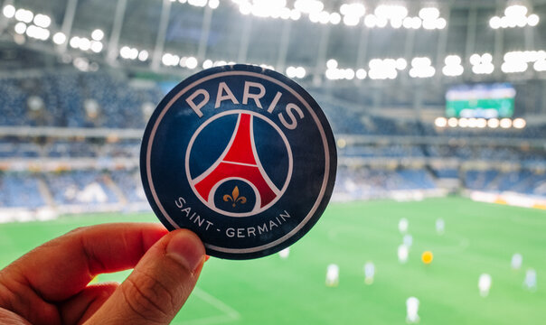 August 30, 2021, Paris, France. The emblem of the football club Paris Saint-Germain F.C. against the backdrop of a modern stadium.