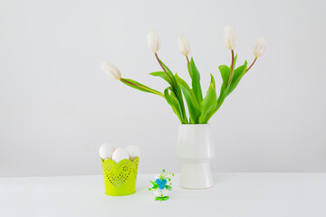 Easter eggs in a green basket