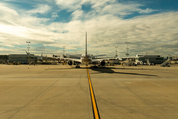 Fototapeta premium 1/16/2022: Los Angeles, California, USA: Airplanes on the runway at LAX.