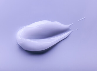 Cream balm purple cosmetic texture smudge on pastel  background