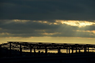 orange sunset and prefabricated building