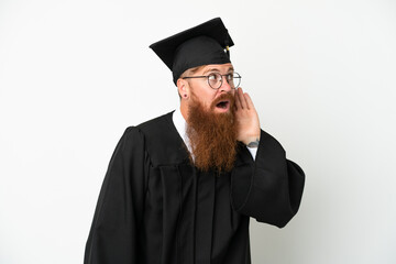Young university graduate reddish man isolated on white background listening to something by putting hand on the ear