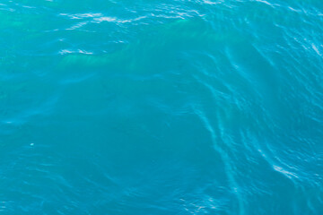 Natural sea blue background sparkling clear water