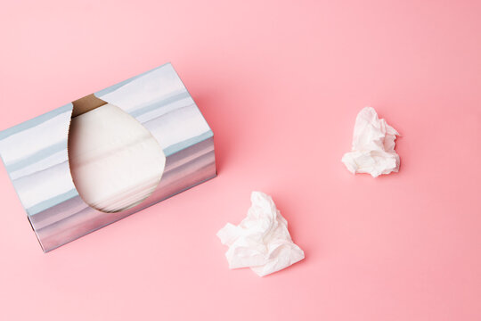 Tissue Box With Tissues On Pink Background