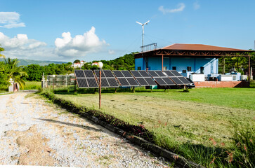 Fototapeta na wymiar Solar Panels On A Rack On The Lawn