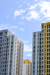 Fototapeta premium Bekasi, West Java, Indonesia, March 5th 2022. Apartment building tower at the heart of the town.