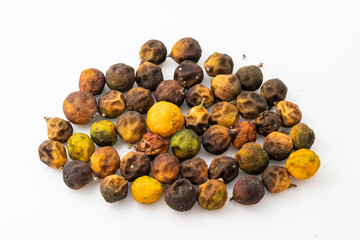 Dried small limes on a white background