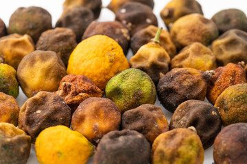 Dried small limes on a white background