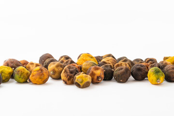Dried small limes on a white background
