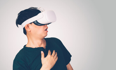 Portrait of young asian man wearing goggles virtual reality with excited isolated on white background, metaverse technology and device, innovation for entertainment and education with modern.