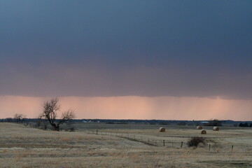 Storm Clouds Over a Farm Field