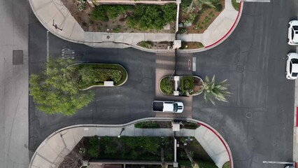 Car entering a gated community