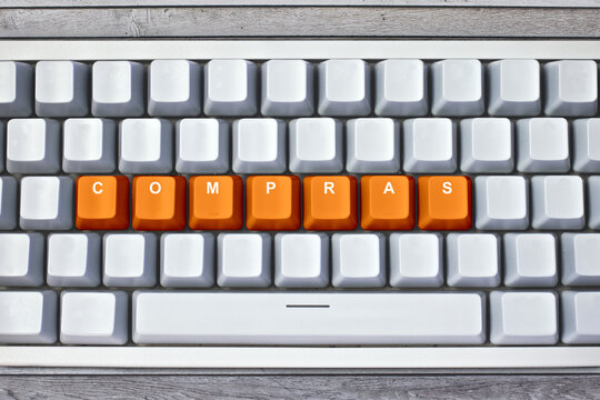 Teclado blanco con palabra compras
