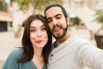 Fototapeta premium Fun couple making silly faces