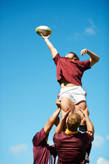Capturing an epic moment. Shot of a young rugby player catching the ball during a lineout. - obrazy, fototapety, plakaty