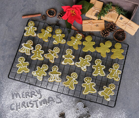 Homemade Christmas cookies. Matcha Shortbread Cookies in Gingerbread Man Shape with Different Patterns.Children most favorites, crispy and delicious