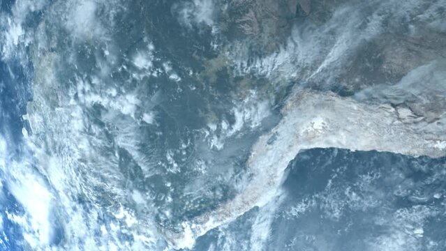 A cinematic rendering of planet Earth during sunrise as view from space with vibrant blue sky atmosphere. World map element of this clip furnished by NASA : https://visibleearth.nasa.gov/collection/14