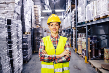 Proud female warehouse worker ready for male work.