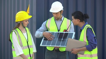 Group of Solar power plant Engineers Team Meeting and discussion to brainstorming with  solar cell  Planning for a New Project of Environmental Power at construction site outdoors