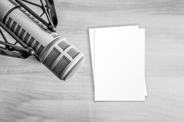 Professional microphone and blank sheet of paper