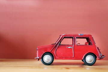 red toy car in vintage style