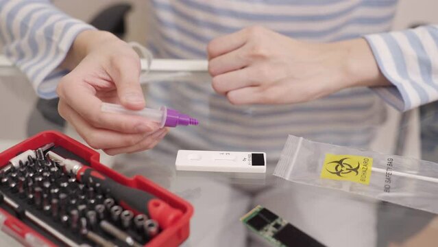 Woman waiting for a rapid self-test of antigens and the test result found no coronavirus, COVID-19.
