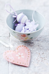 Simple Easter Decoration. Bright stone background. Soft focus. Close up.