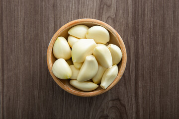 Fresh garlic on wooden table