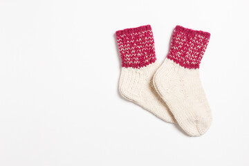 knitted wool socks on a white background