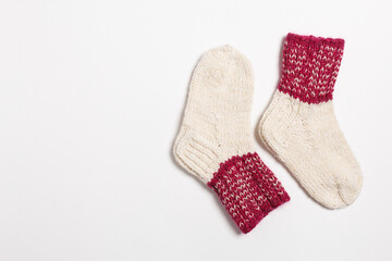knitted wool socks on a white background