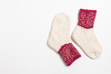 knitted wool socks on a white background